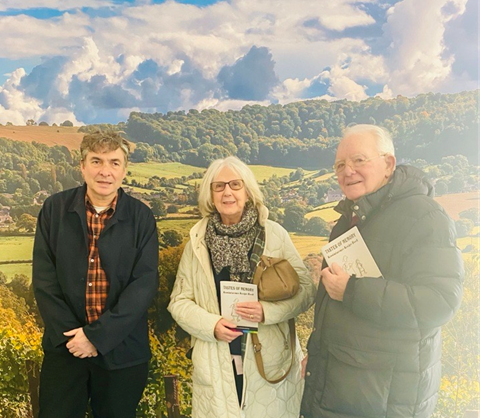 Attendees at the recipe book launch, with artist Tom Cross