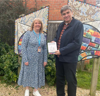 Sally Williams, Development Officer for Ageing with Creativity with artist Tom Cross at the Heritage Hub