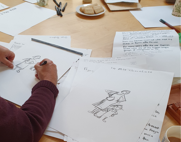 Artist, Tom Cross sketching illustrations inspired by recipes and stories