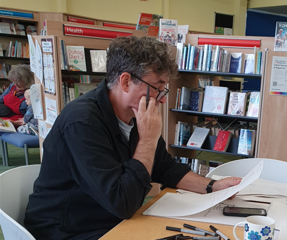 Artist Tom Cross capturing stories and recipes in his sketches